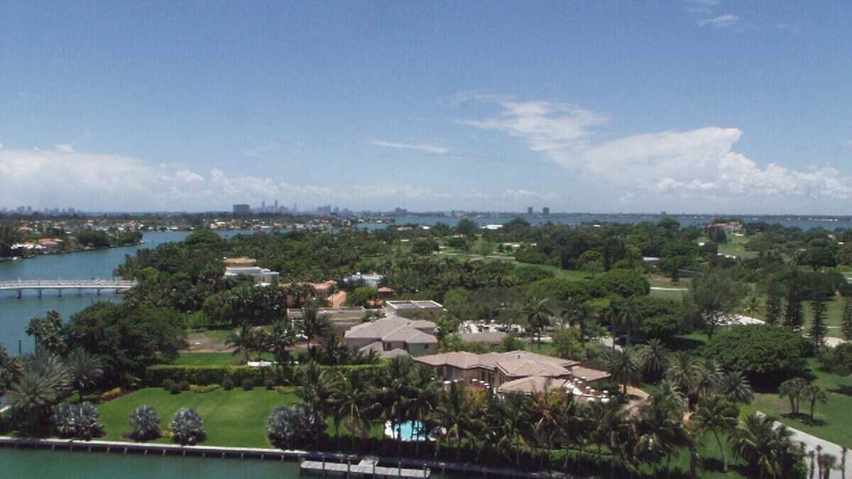 Aerial view of Indian Creek Village with its golf course anchoring the center of the island.